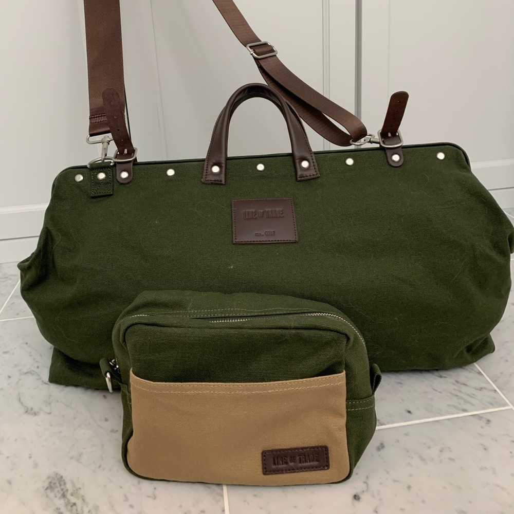 Army green and brown weekend bag and matching toiletry bag.